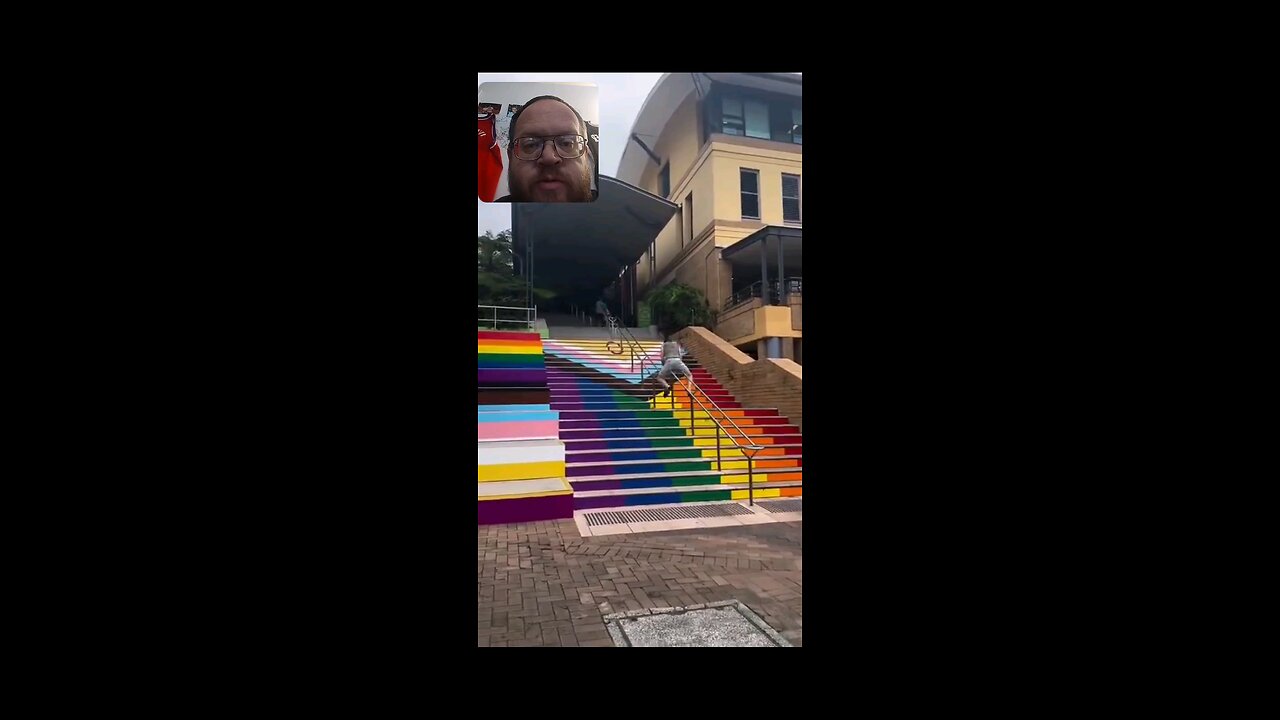 Man Climbs Up Railing To Avoid WOKE Stairs