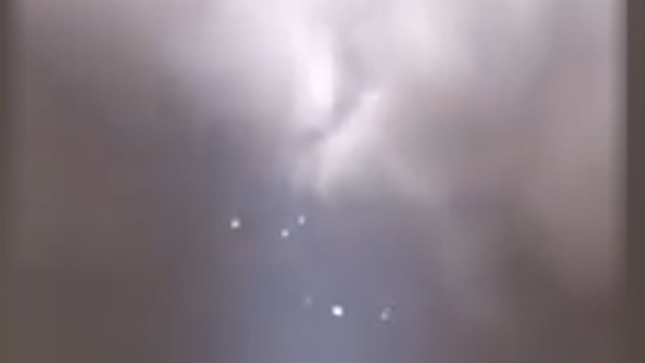 Three UFOs in the light leaking from the cloud [space]
