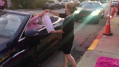 Creative drive-thru event raised money for cancer screenings