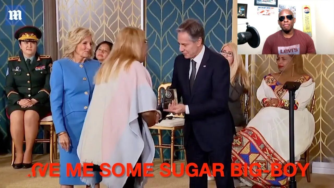 Jill Biden Gives Man A ‘Woman of Courage’ Award And Blinken Kisses Him