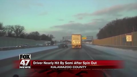 Dashcam video shows close call involving semi