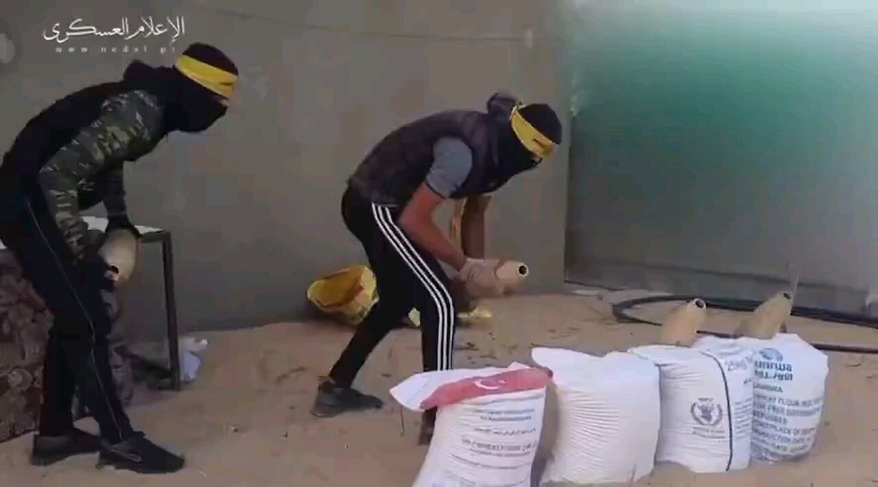 United Nations / Hamas - Is there a difference? Missiles leaning on "Humanitarian Aid" food bags!