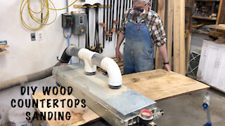 Kitchen Remodel Step 3 - Using the ultra wide belt sanding machine to sand wood kitchen countertop