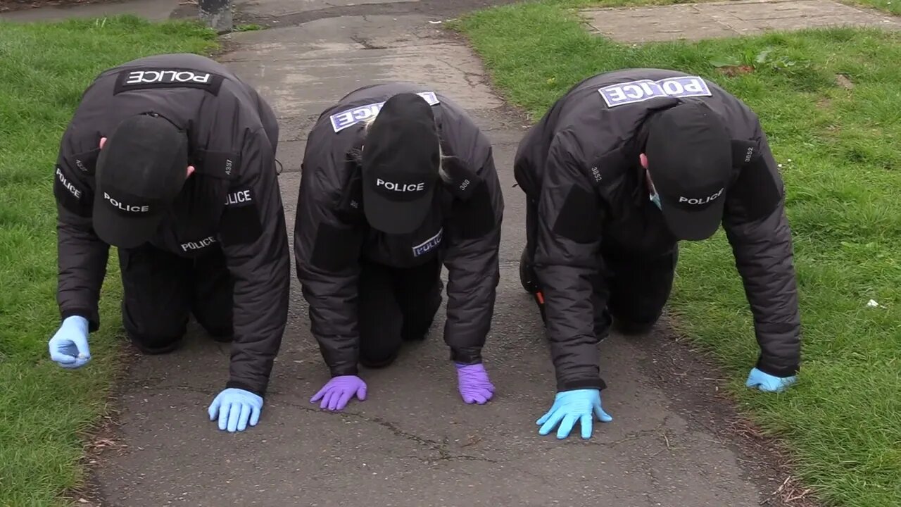 Police On Hands And Knees Searching For Their Credibility