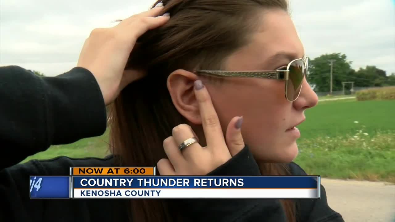 Country thunder fan stuck by lightning returns despite extreme heat