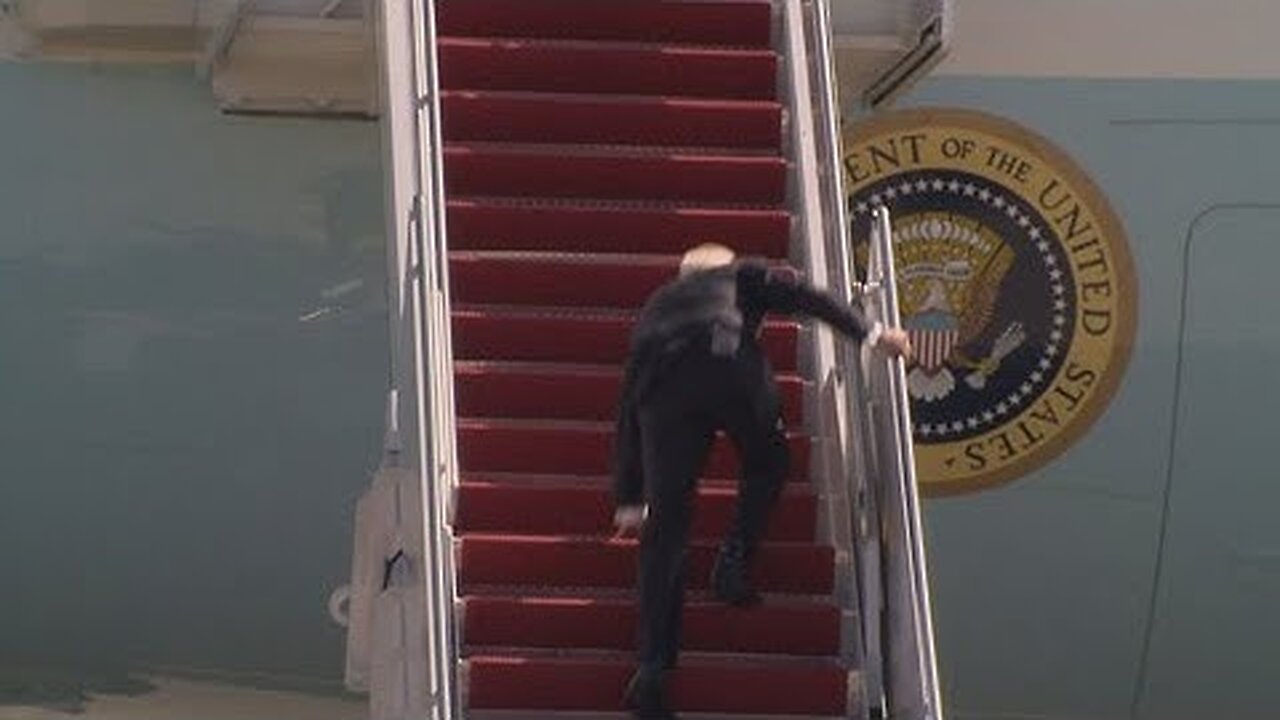 President Biden falls down walking up steps of Air Force One