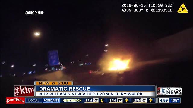 Body cam footage shows dramatic rescue from fiery wreck