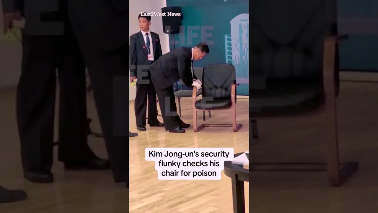 Kim Jong-un's security flunky checks his chair for poison