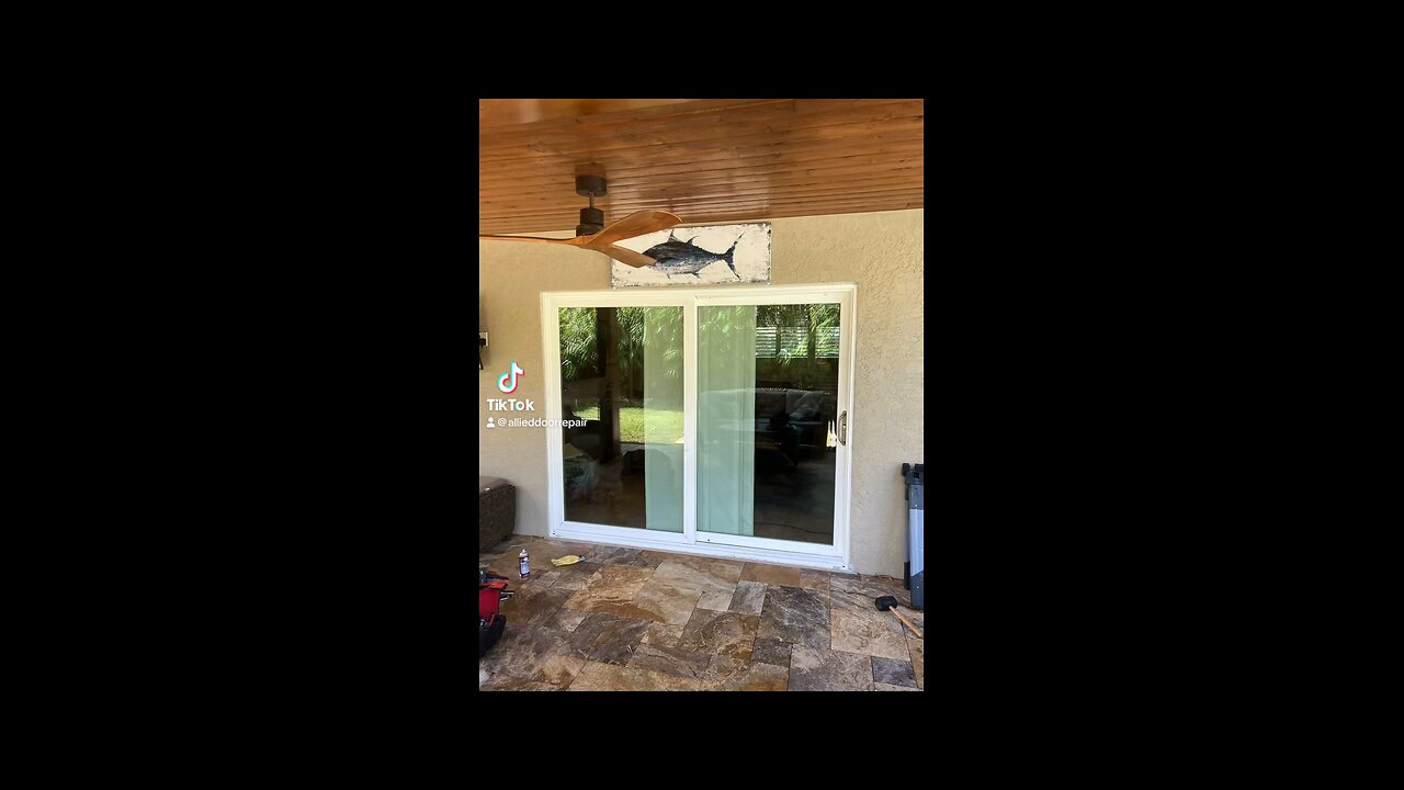 Hurricane impact sliding glass door repair; roller replacement, in Boca Raton, Fl.