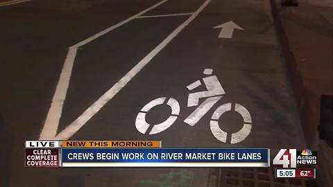 Crews begin work on River Market bike lanes