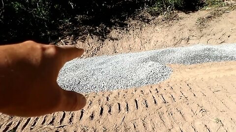 Getting the gravel in on the first site.