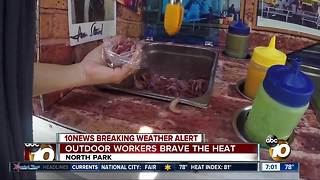 Outdoor workers brave the heat in North Park