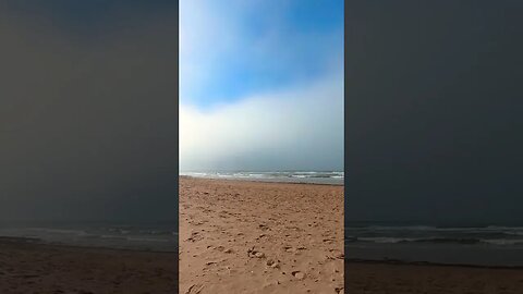 Dark Clouds Roll in on the Beach
