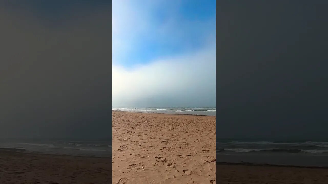 Dark Clouds Roll in on the Beach