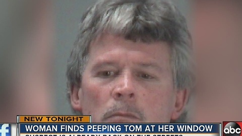 Woman finds peeping tom at her window