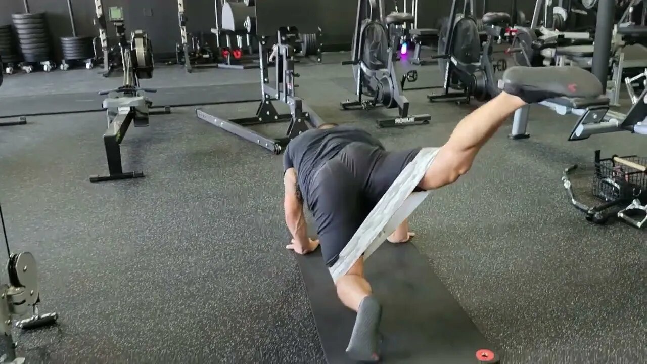 Quadruped Leg Drag to Hip Abduction w/ Glute Band