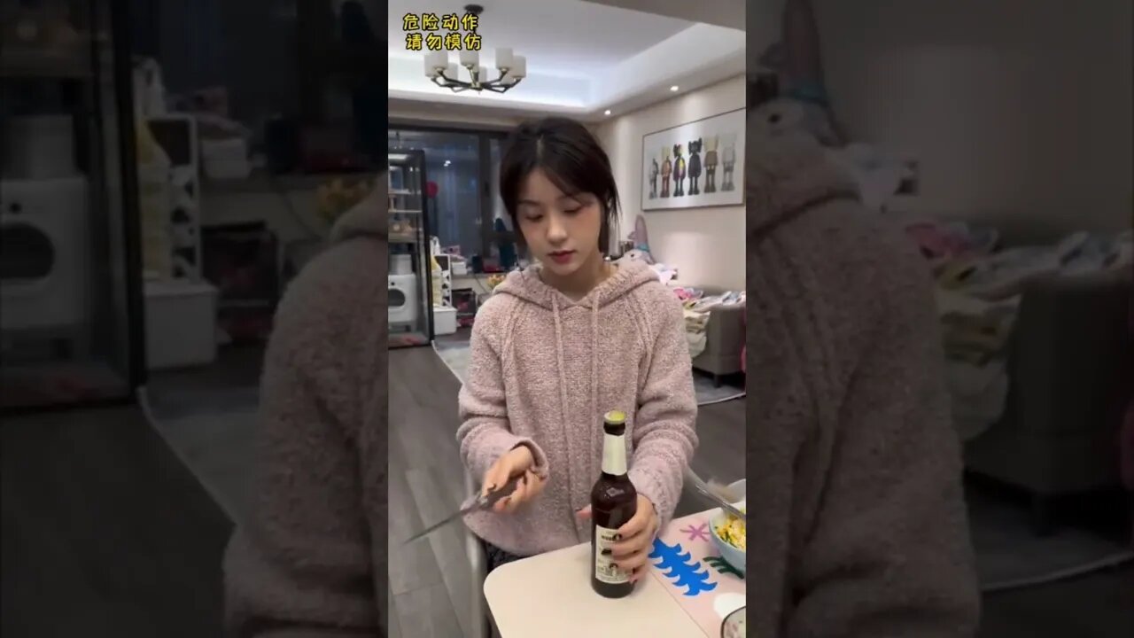 Pretty Chinese Girl Opens Beers With A Knife