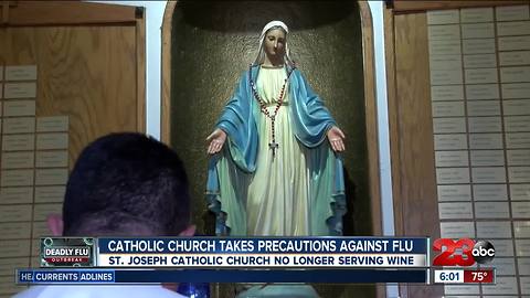 Catholic churches stop serving wine to keep the flu from spreading