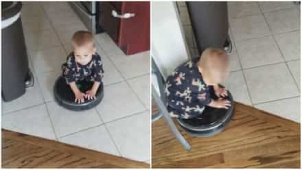 Child rides vacuum cleaner robot