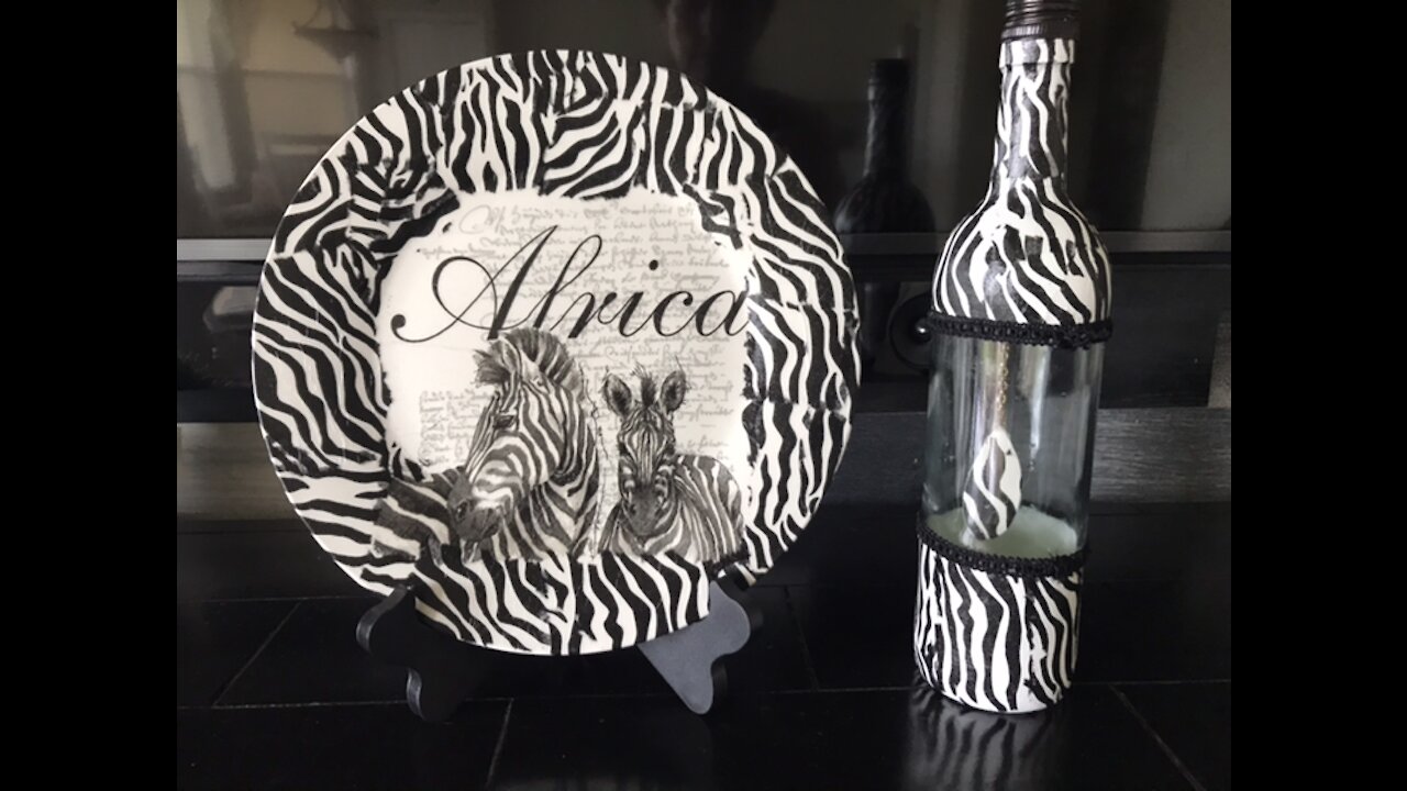 Plate and bottle decorated with African scene