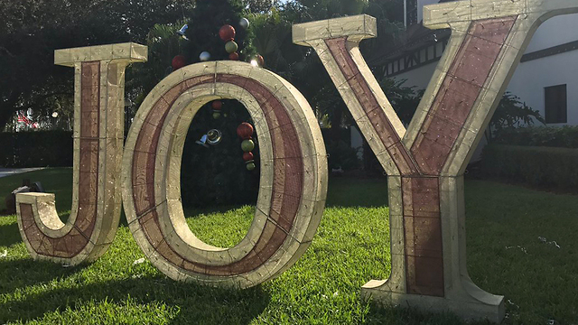 Lowe's donates new 'Joy' sign to Hoffman's Chocolates after theft
