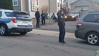 Boston police investigating a car that ran into a fence on Julian Street