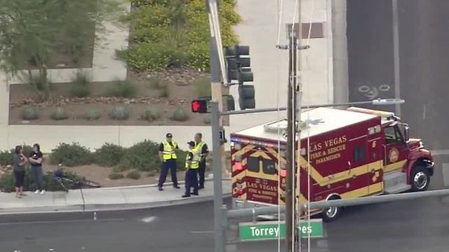 Ambulance on the scene of a car, bicycle crash