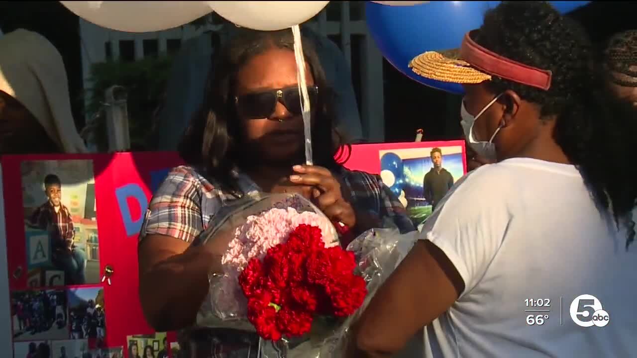 Community holds vigil for Glenville High School football player