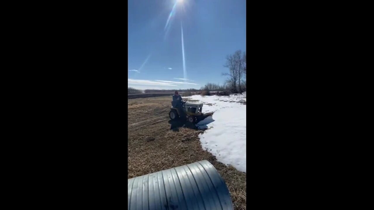 Tim driving a tractor into a snow bank #shorts