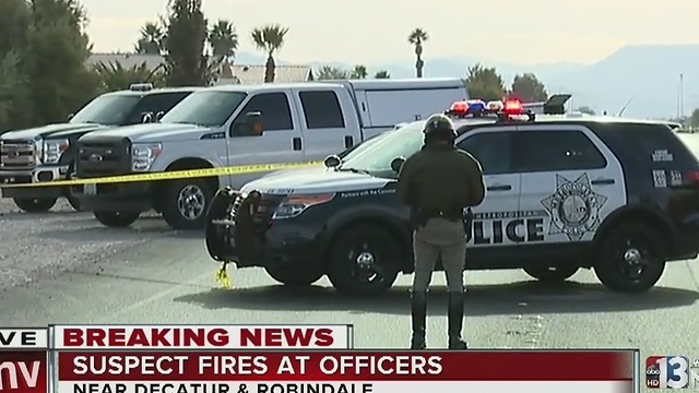 Man barricaded in house after firing at Las Vegas police