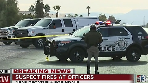 Man barricaded in house after firing at Las Vegas police