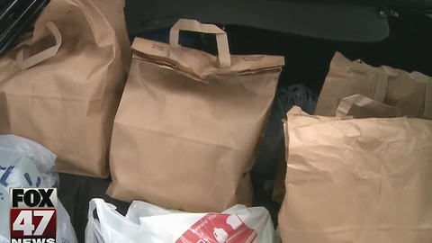 Volunteers of America deliver meals on Christmas