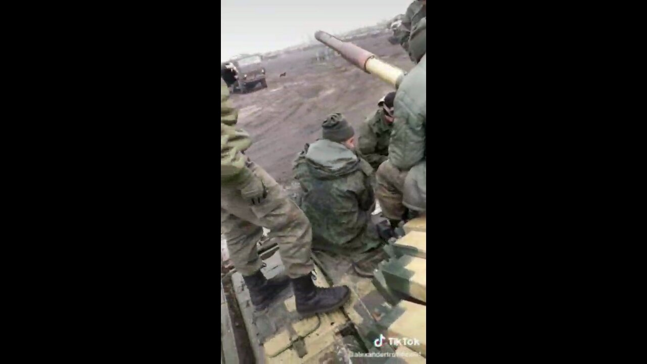 Mobilized fighters from Donbass and a captured Ukrainian Armed Forces tank with pixel camouflage