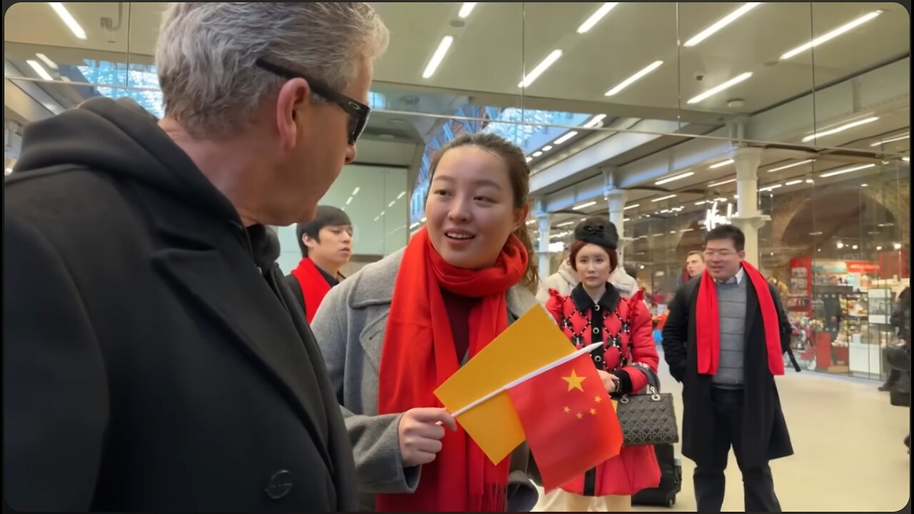 Chinese Commies Don't Want To Be On Video. Stick Dumb Faces In Camera. Goes Viral