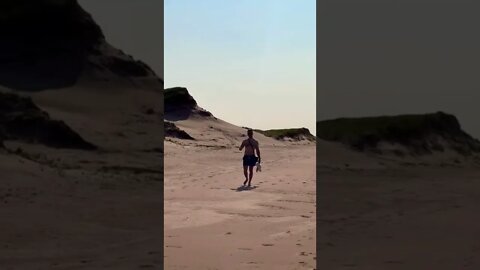 Exploring a large empty beach