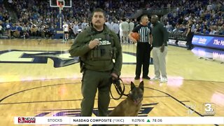 Marine Veteran and his Police Service dog honored with award at Creighton game