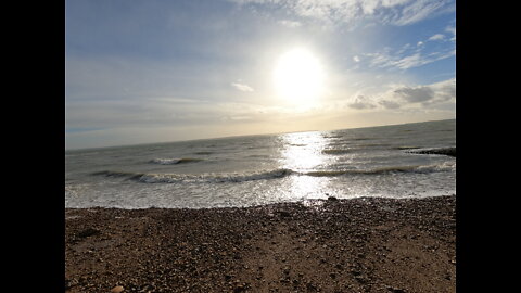 Clearing down my cook system (to mak a brew) on a beach during a sunset.