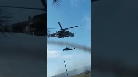 MI-24 Helicopters Firing at Enemy Positions