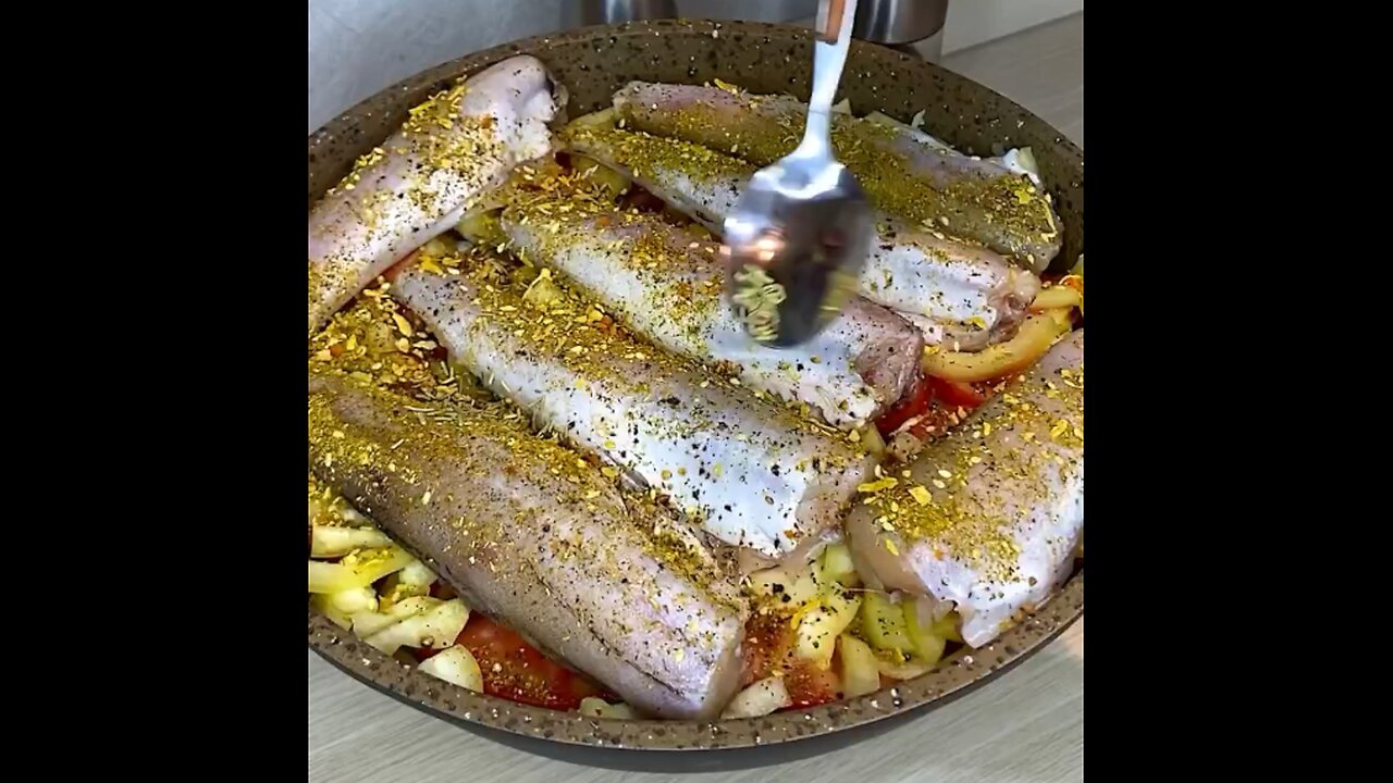 Recipe for Juicy Pollock ( Fish ) with Vegetables in a Skillet