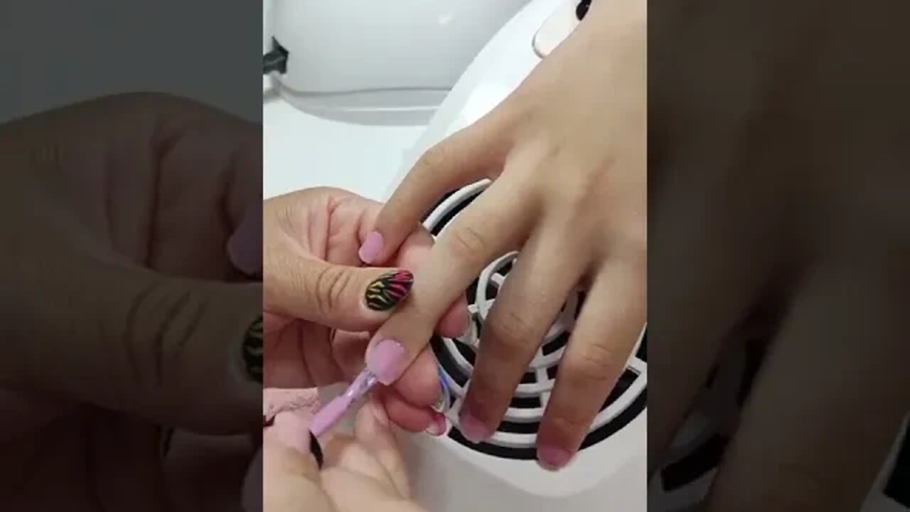 I took my nails off and painted them pink