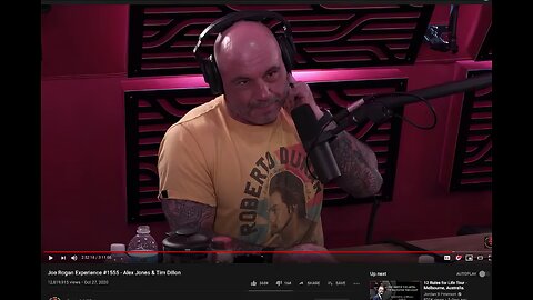 Joe Rogan caught getting instructions from his handler during Alex Jones podcast relax we're here