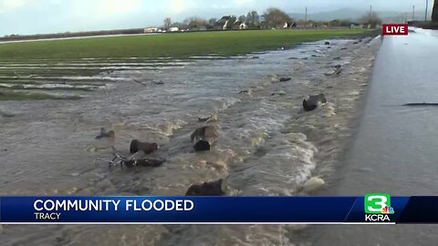 Flooding in Tracy leads to evacuation warning as water surrounds homes, closes roads