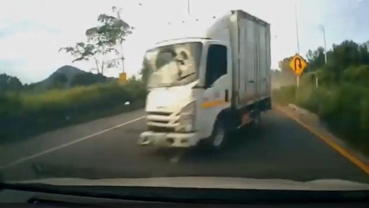 Out of control truck slams into oncoming traffic after tire blowout