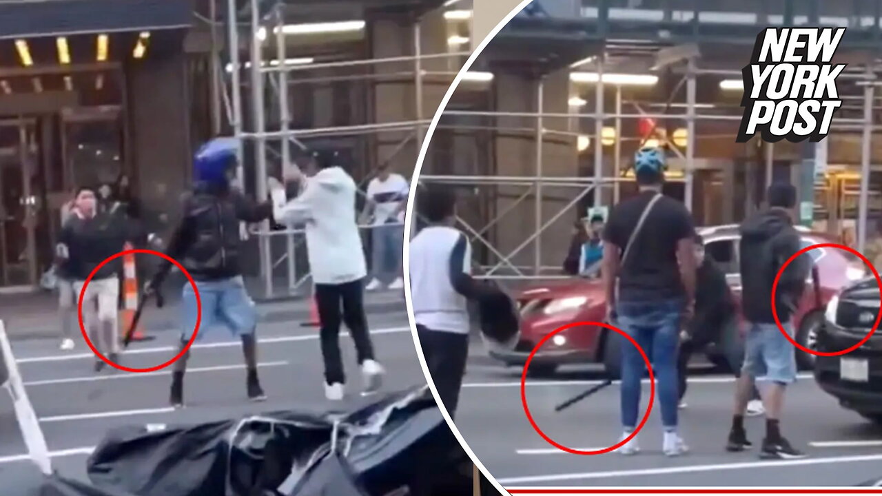 Migrants swing bats, belts and even traffic cones at each other in wild brawl outside NYC hotel