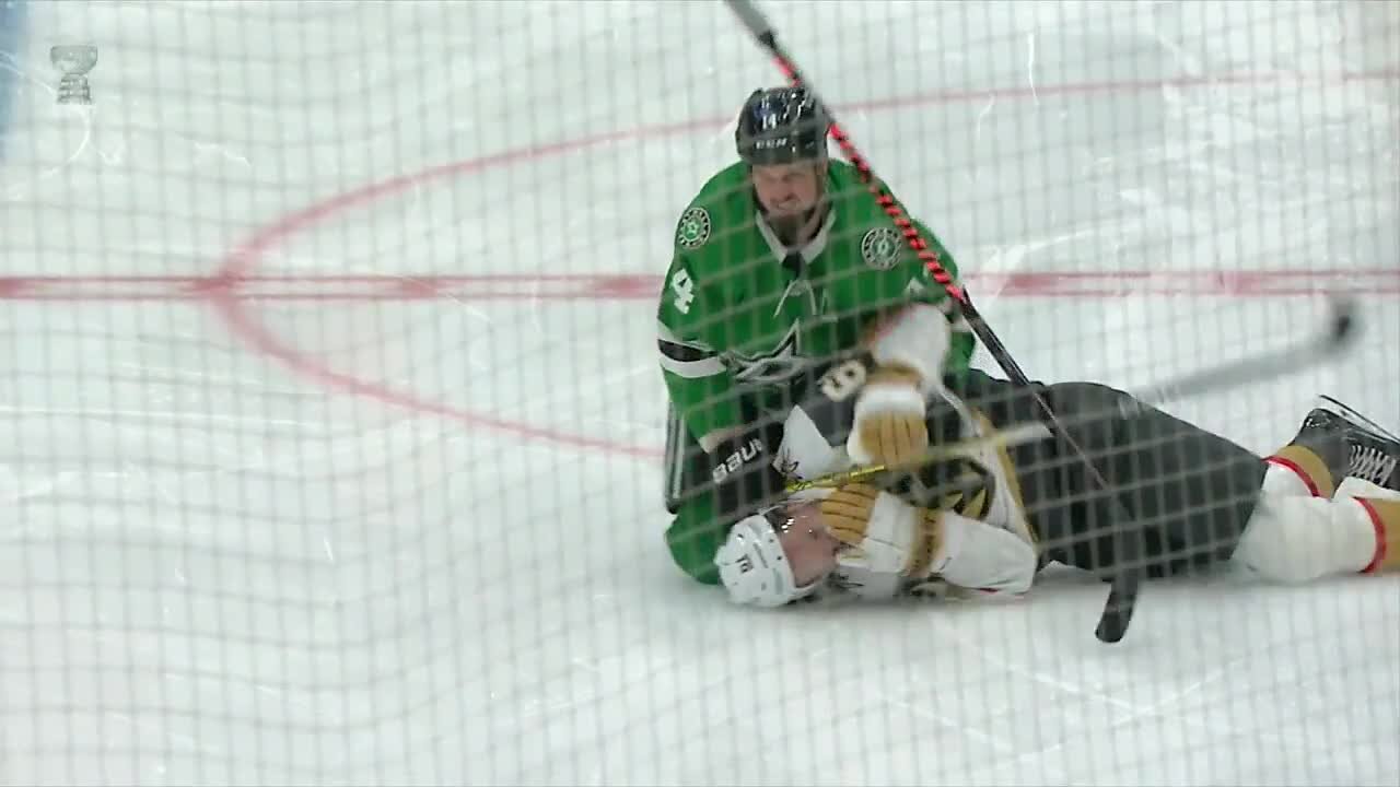 Dallas Stars captain cross-checks Golden Knights' captain Mark Stone during Game 3