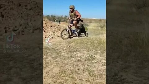 Neobanderovtsy of the 21st century on bicycles with a Maxim machine gun of the 1941 model