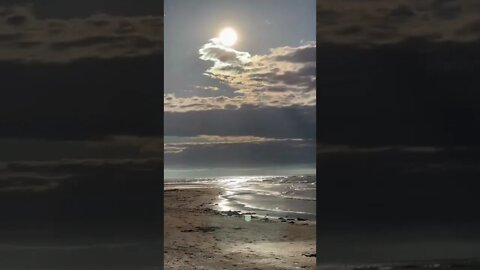 Sun peeking over the clouds