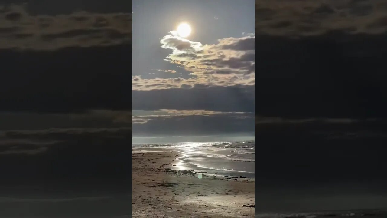 Sun peeking over the clouds