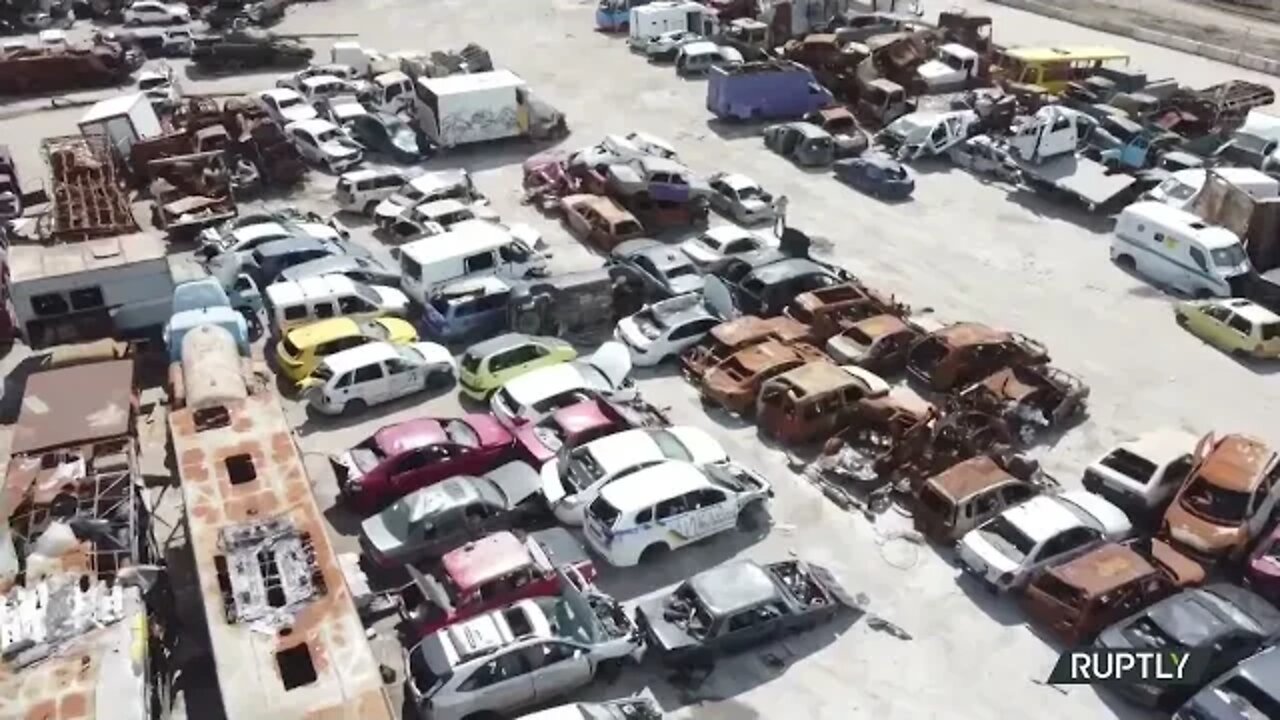 Mariupol scrapyard now a cemetery for burnt tanks and cars (Drone footage)