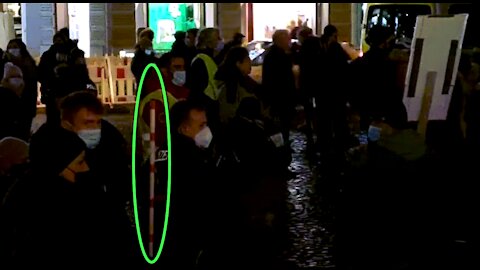 German police start measuring distances between people with folding rulers in public.